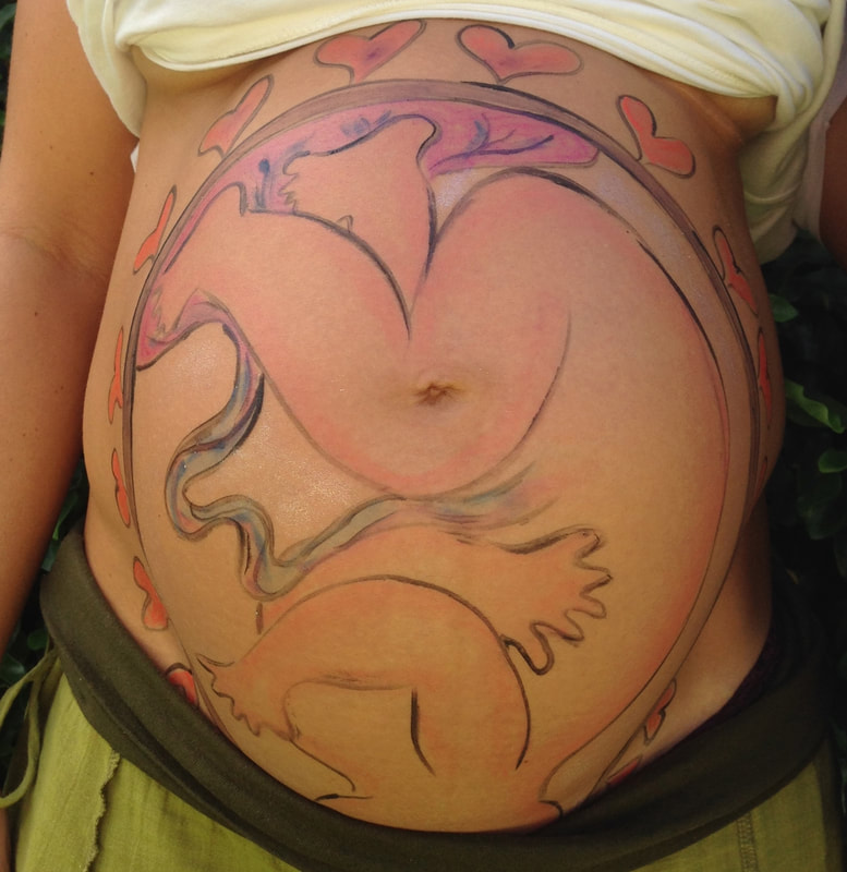 Natural Ultrasound is a technique created by Mexican Midwife Naoli Vinaver in 1992. Belly painted by Naoli Vinaver. Close up photo by Naoli Vinaver.