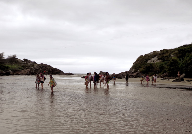 Outdoor class, crossing the river at Matadeiro beach in Art of Birth workshop by Naoli Vinaver. Photo by Naoli Vinaver
