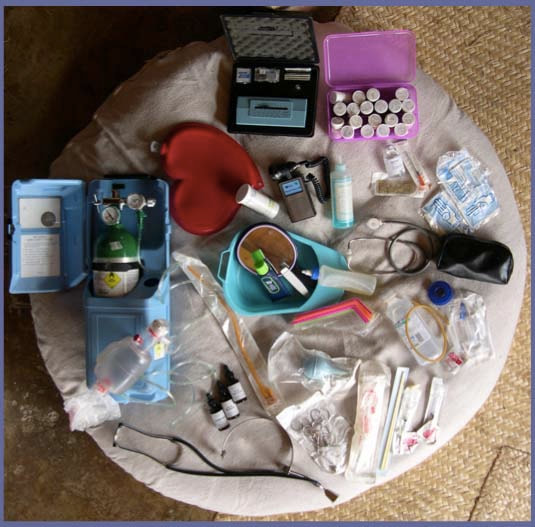 The midwife's bag containing materials and elements to help her handle the various possible complications at a home birth. Naoli Vinaver's workshop Challenging births.